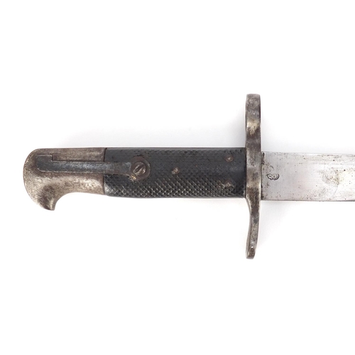 321 - German Military interest saw back bayonet with scabbard, impressed marks to the blade, 63.5cm wide