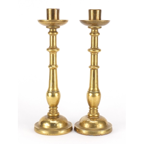 18 - Pair of antique continental bronze candlesticks, each 31.5cm high