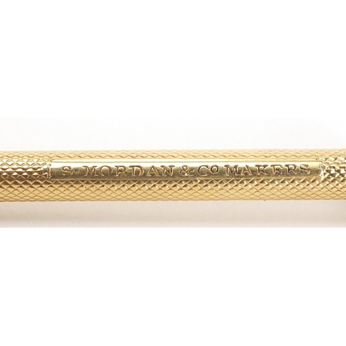 127 - S Mordan & Co unmarked gold propelling pencil with amethyst top, 8.5cm in length, 8.8g