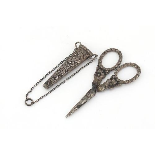 897 - Pair of Victorian unmarked silver chatelaine sewing scissors with case, 9cm in length, 12.0g