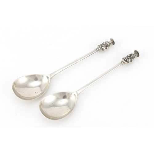 957 - Pair of silver apostle spoons by Josiah Williams & Co, 20cm in length, 156.5g