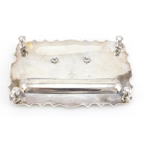 893 - Rectangular silver desk stand by Walker & Hall, raised on four scroll feet, with cut glass inkwell, ... 