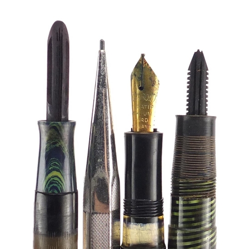 131 - Fountain pens and propelling pencils including a Waterman's brown ripple with 9ct gold band, Conway ... 