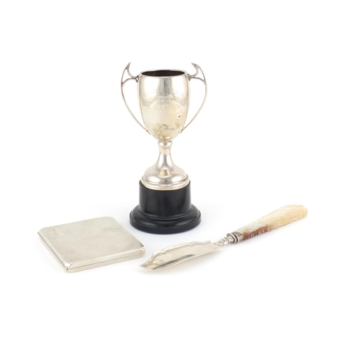 949 - Silver items including a rectangular cigarette case and a twin handled trophy on stand, various hall... 