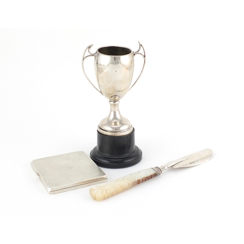 949 - Silver items including a rectangular cigarette case and a twin handled trophy on stand, various hall... 