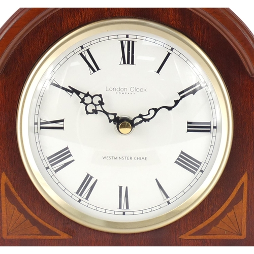 2295 - London Clock Company inlaid mahogany mantel clock, with Westminster chime and receipt for £100, 21cm... 
