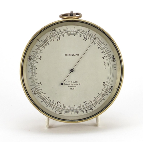 2594 - Brass cased compensated barometer by T W Heeler, 12cm in diameter