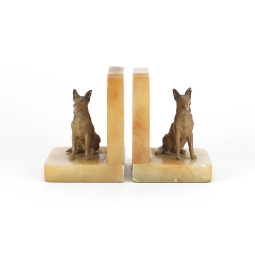 2321 - Pair of Art Deco onyx German shepherd design bookends, each 12cm high
