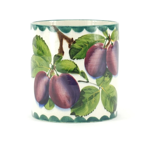 2347 - Wemyss Ware cylindrical pot, hand painted with plums, retailed by T Goode & Co, factory marks to the... 