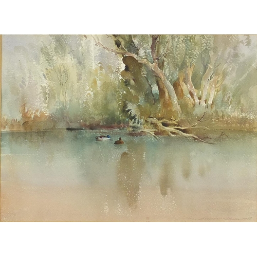 2056 - Ian Armour-Chelu 1983 - Trees by a still pond, watercolour, labels and inscriptions verso, mounted a... 