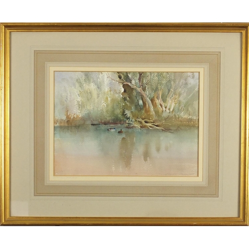 2056 - Ian Armour-Chelu 1983 - Trees by a still pond, watercolour, labels and inscriptions verso, mounted a... 