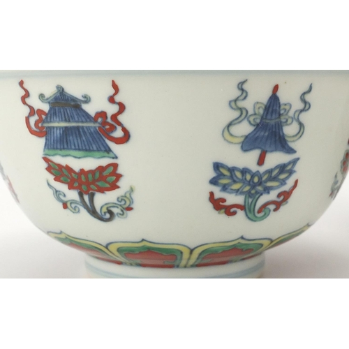 412 - Two Chinese porcelain bowls, including a Doucai example hand painted with fish and vases, the Doucai... 