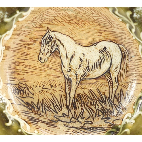 820 - Rare Royal Doulton plate by Hannah Barlow, the central panel incised with a horse, impressed marks a... 