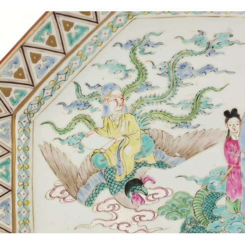 425 - Chinese octagonal porcelain charger hand painted in the famille rose palette with figures riding a d... 