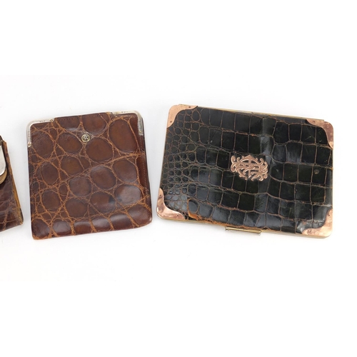 56 - Four crocodile skin effect leather wallets and purses, one with 9ct gold mounts the others with silv... 