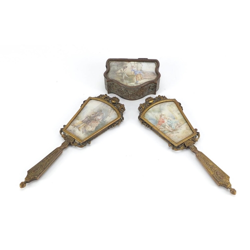 51 - 19th century French ornate brass dressing table items, comprising two hand mirrors and a jewel box, ... 