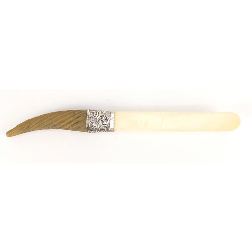137 - Rhinoceros horn handled ivory page turner with silver mount, indistinct Birmingham hallmarks, 34.5cm... 