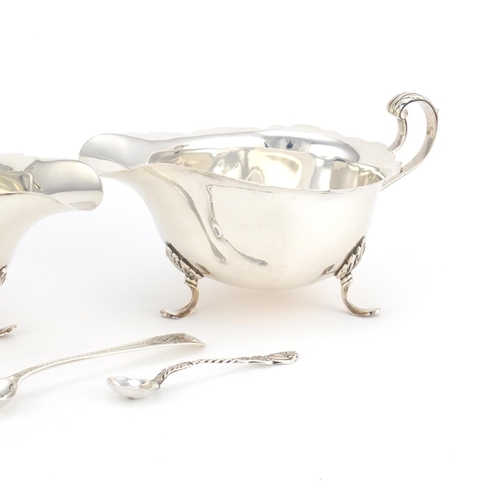 941 - Silver items including a pair of three footed sauce boats by Mappin & Webb and a mustard with blue g... 