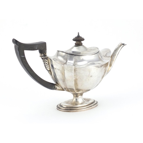 867 - Victorian silver teapot with fluted body and ebonised handle and knop, indistinct maker mark London ... 