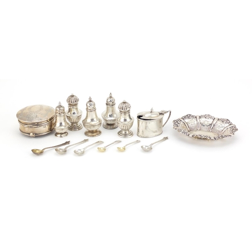 942 - Silver items including an oval bon bon dish, circular jewel box and two pairs of casters, various ha... 