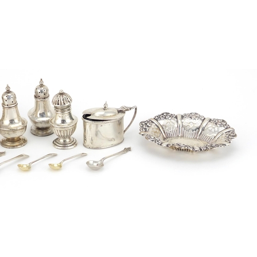 942 - Silver items including an oval bon bon dish, circular jewel box and two pairs of casters, various ha... 