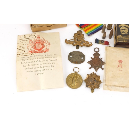 279 - British Military World War I Militaria including brass Mary tin with tobacco, bullet, victory medal ... 