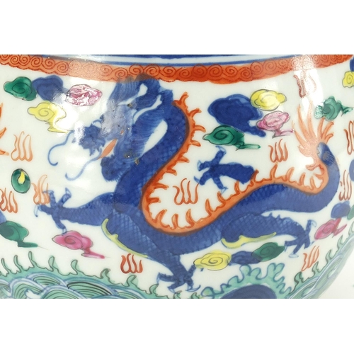 428 - Chinese porcelain Doucai garlic neck vase, hand painted with dragons chasing the flaming pearl among... 