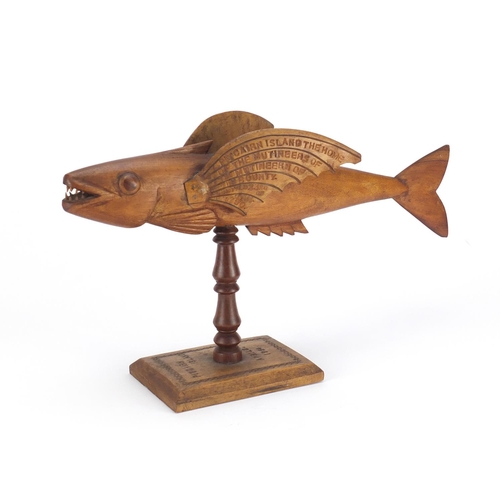 90 - Pitcairn Island carved wood flying fish, dated 1954, one wing impressed made by Fred Christian Great... 