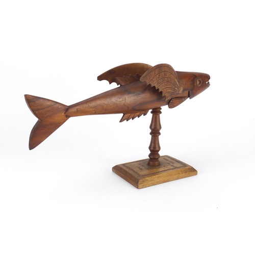 90 - Pitcairn Island carved wood flying fish, dated 1954, one wing impressed made by Fred Christian Great... 