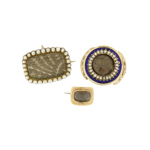 989 - Georgian and later gilt metal mourning brooches and a mourning necklace clasp, with seed pearl and b... 