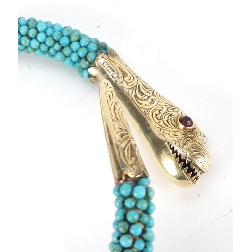 975 - Victorian unmarked gold and turquoise bead serpent bracelet set with garnet eyes