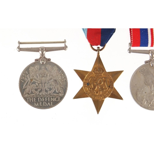 287 - British Military World War II medal group including Territorial Efficient service medal, awarded to ... 