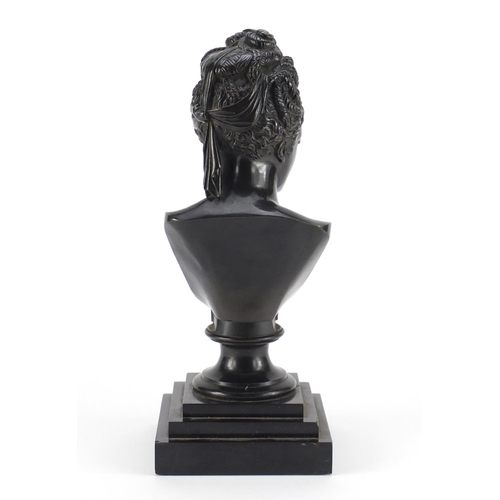 7 - 19th century classical patinated bronze bust of a nude female, raised on a square stepped black slat... 