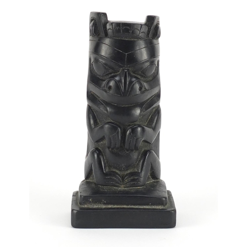 723 - Haida argillite carving of a totem pole, 20.5cm high