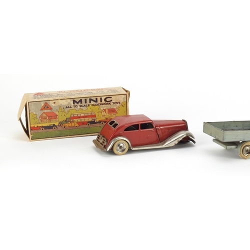 352 - Tri-ang Minic comprising a saloon car, pick up and Vauxhall Cabriolet with box