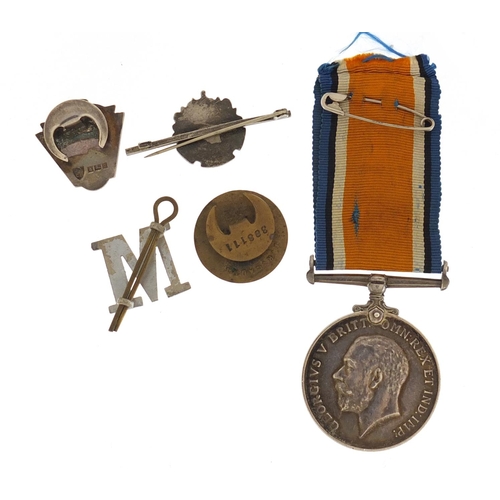 284 - British Military World War I 1914-18 War medal and Military badges, the medal awarded to 9562SJT.L.J... 
