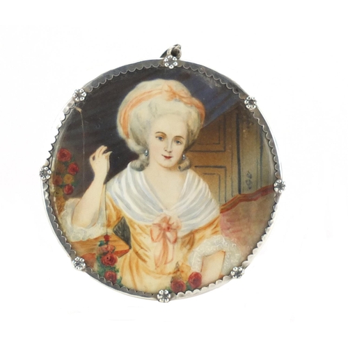 121 - 19th century hand painted portrait miniature of a female in an interior, housed in an unmarked silve... 