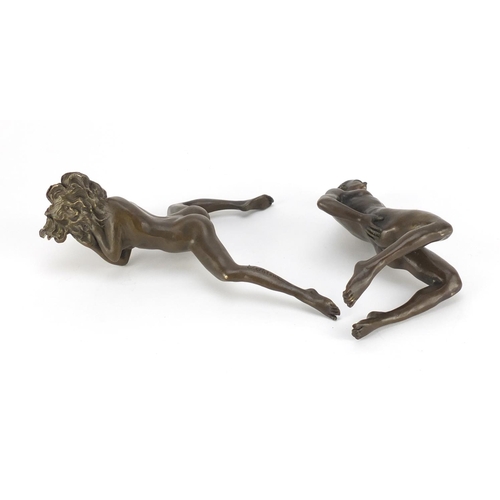 11 - J Patoue, two erotic patinated bronzes of a nude male and a female, both signed, the largest 15cm in... 