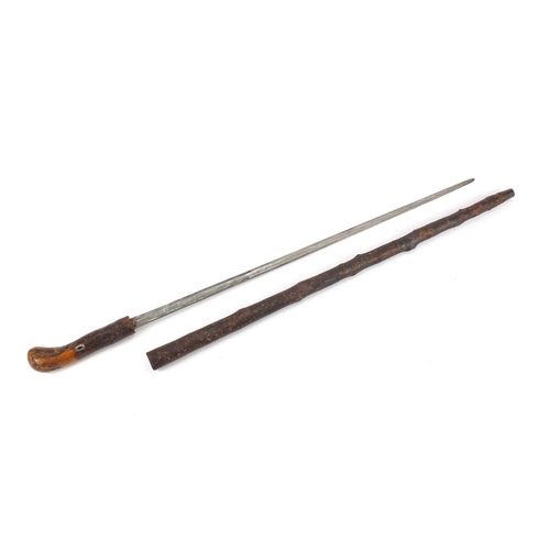 162 - Naturalistic sword stick with steel blade, 91cm in length