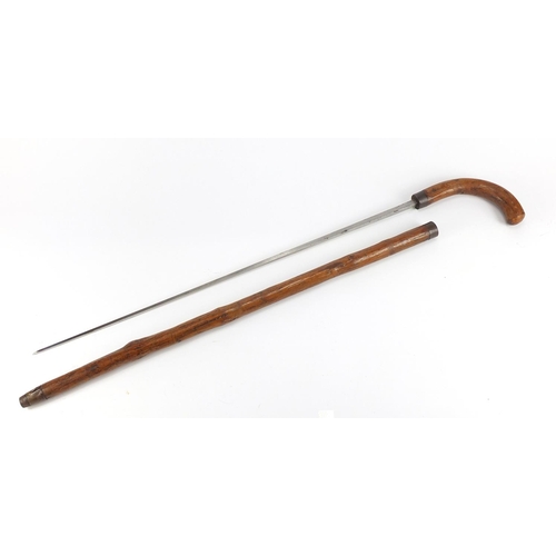 161 - Naturalistic Customs officers sword stick with steel blade by E Mole of Birmingham, 95cm in length