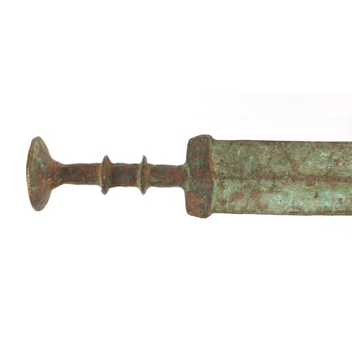 331 - Islamic patinated bronze sword, 63cm in length