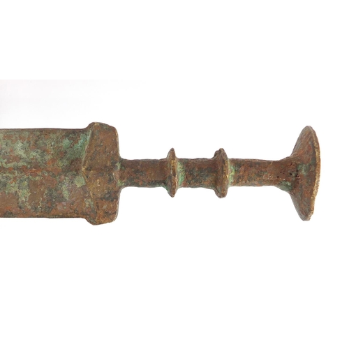 331 - Islamic patinated bronze sword, 63cm in length