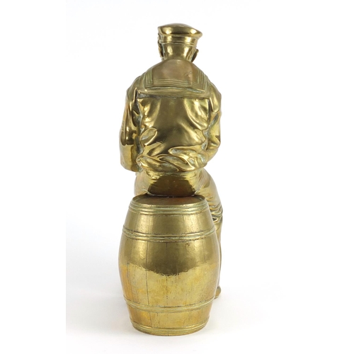 75 - Early 20th century Naval interest brass figure of a sailor from the HMS Indefatigably, 41cm high