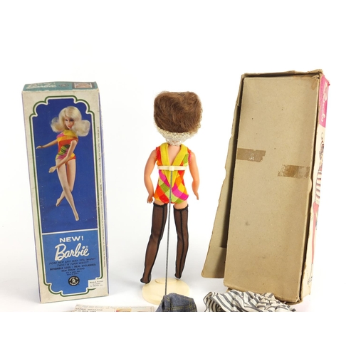374 - Two 1960's dolls with accessories and boxes comprising Sindy in Weekenders with original clothes and... 