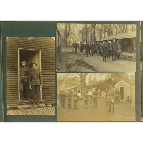 197 - Early 20th century photographs and postcards, some Military arranged in two albums including Royal M... 