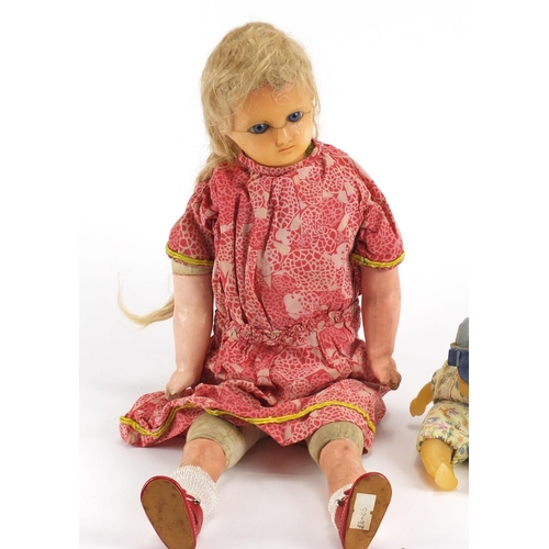 364 - Two antique wax headed dolls including one of a boy with wax body, the largest 47cm in length