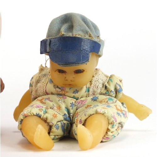 364 - Two antique wax headed dolls including one of a boy with wax body, the largest 47cm in length