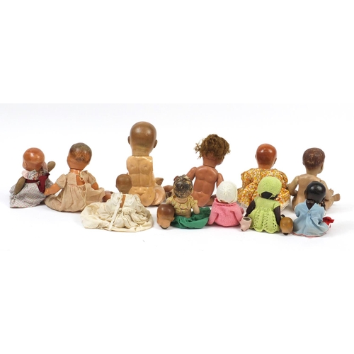 372 - Eleven vintage dolls and three heads including a large German example by Heinrich Handwerck and Arma... 