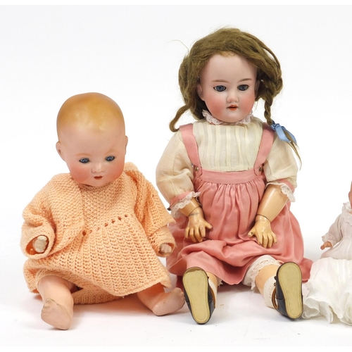 367 - Four Armand Marseille bisque headed dolls with jointed limbs, numbered 351, 351, 370 and 590, the la... 