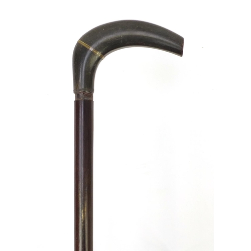 142 - Horn handled walking stick with hardwood shaft, possibly rhinoceros horn, 86cm in length